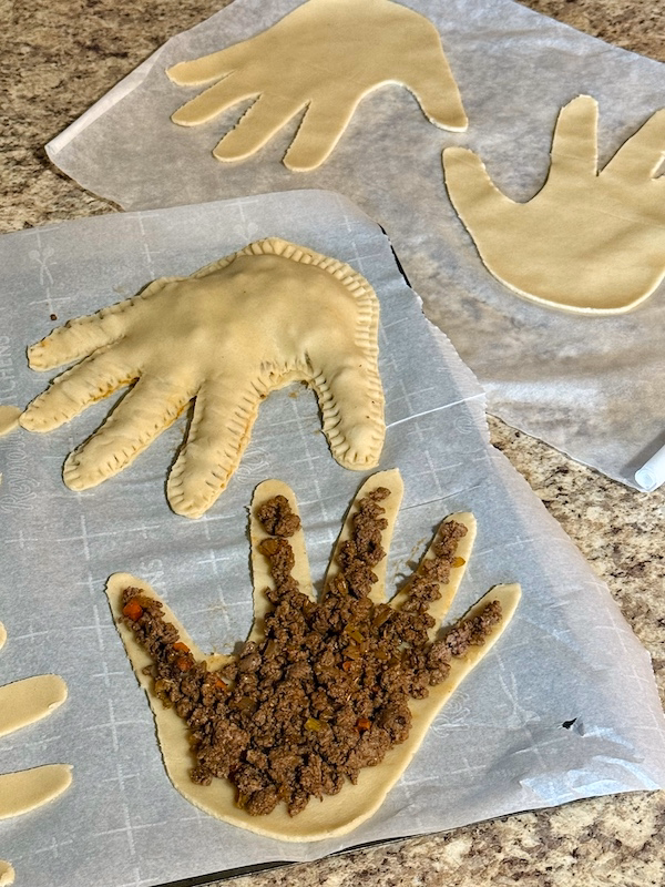 Thing hand pies being filled